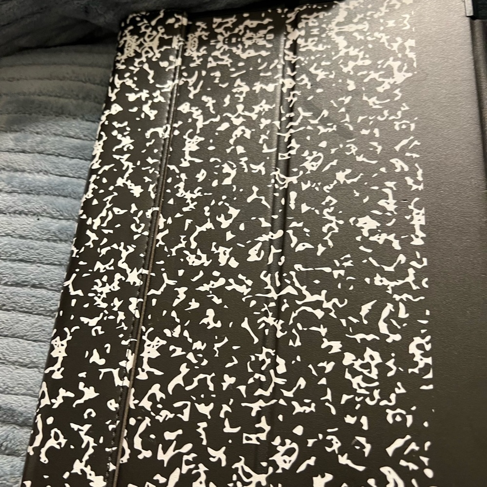Ten inch composition note book tablet cover.